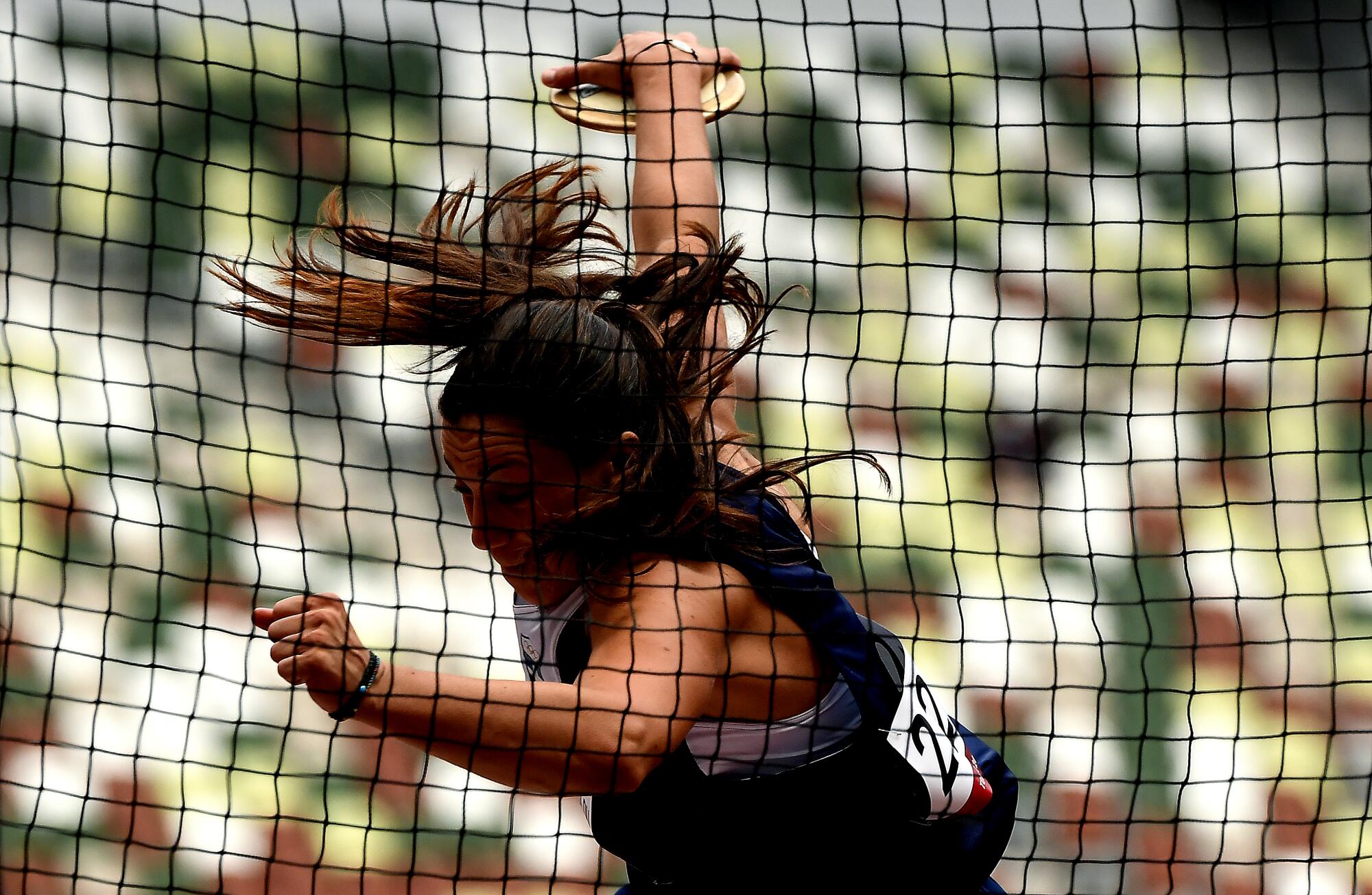 Chrysoula Anagnostopoulou of Greece makes a throw in the women's discus throw qualifying.