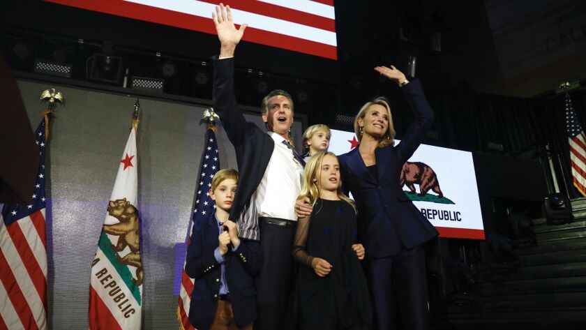 Gavin Newsom, wife Jennifer Siebel Newsom and their family celebrate his win as governor of California at Exchange in downtown Los Angeles.