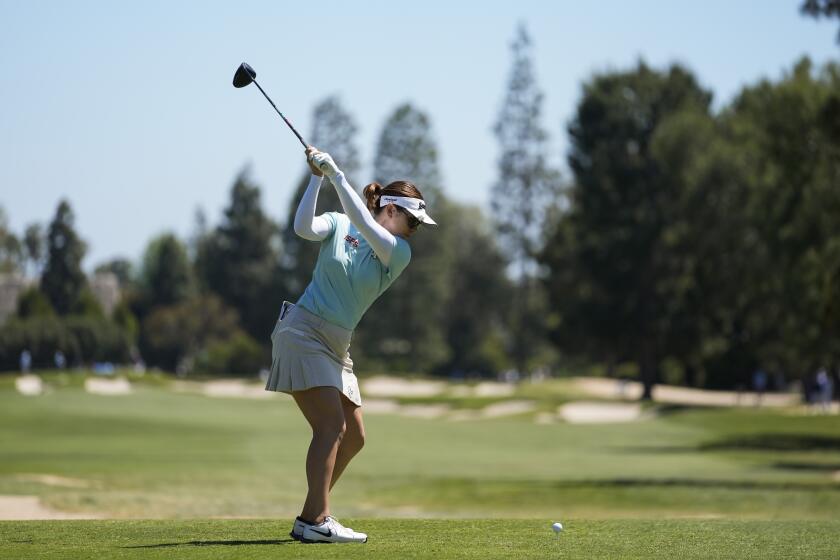 Hannah Green hits from the second tee during the third round of the LPGA's JM Eagle LA Championship golf tournament at Wilshire Country Club, Saturday, April 27, 2024, in Los Angeles. (AP Photo/Ashley Landis)