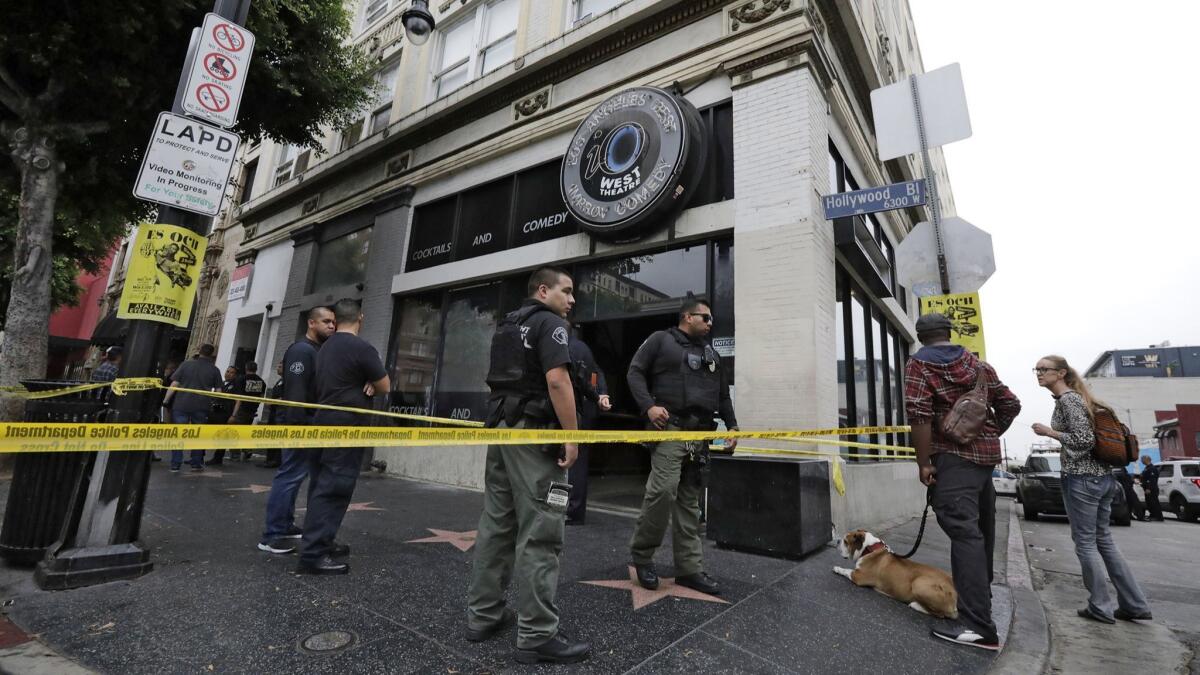 The four-story building is on the corner of Cosmo Street and Hollywood Boulevard.