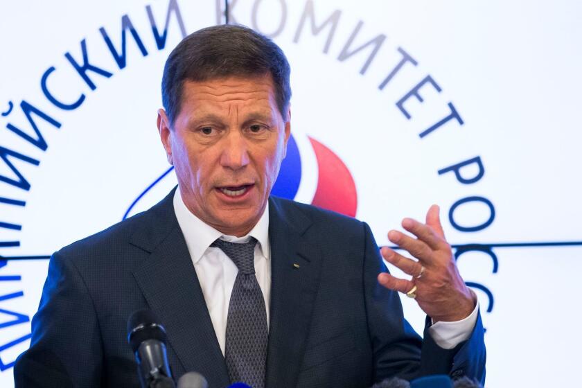 President of Russia's Olympic Committee Alexander Zhukov gestures while speaking to the media after the meeting of Russia's Olympic Committee in Moscow, Russia Wednesday, July 20, 2016. Zhukov says he expects a final decision by Sunday on whether the entire Russian team will be banned from next month's games in Rio over doping. (AP Photo/Alexander Zemlianichenko)