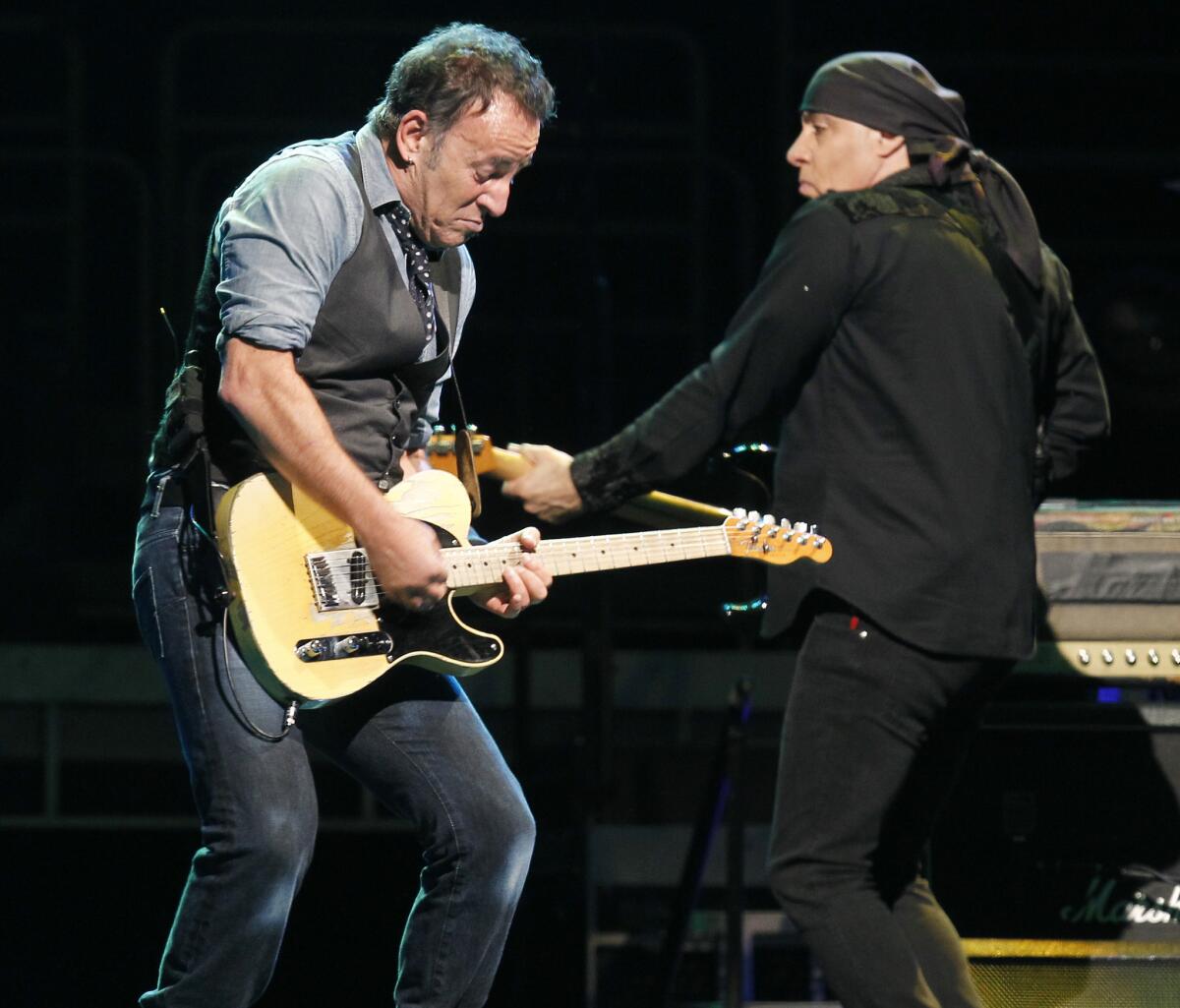 Bruce Springsteen performs with longtime E Street Band mate Stevie Van Zandt during a 2012 tour stop in Anaheim. Springsteen and the band have recorded a new studio version of the Suicide song "Dream Baby Dream" and posted a new video to mark the end of the Wrecking Ball tour.