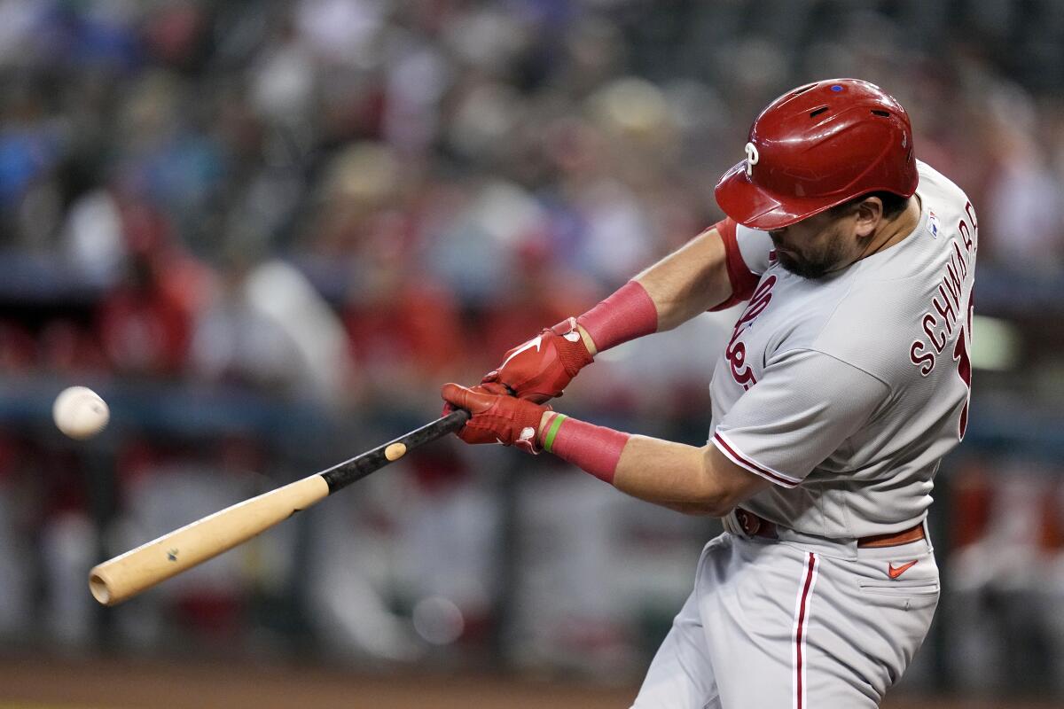 Schwarber hits leadoff homer, sparks Phillies to 15-3 win over