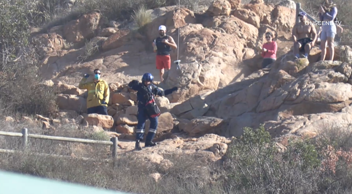 A helicopter crew rescued an injured 41-year-old woman on Cowles Mountain on Sunday.