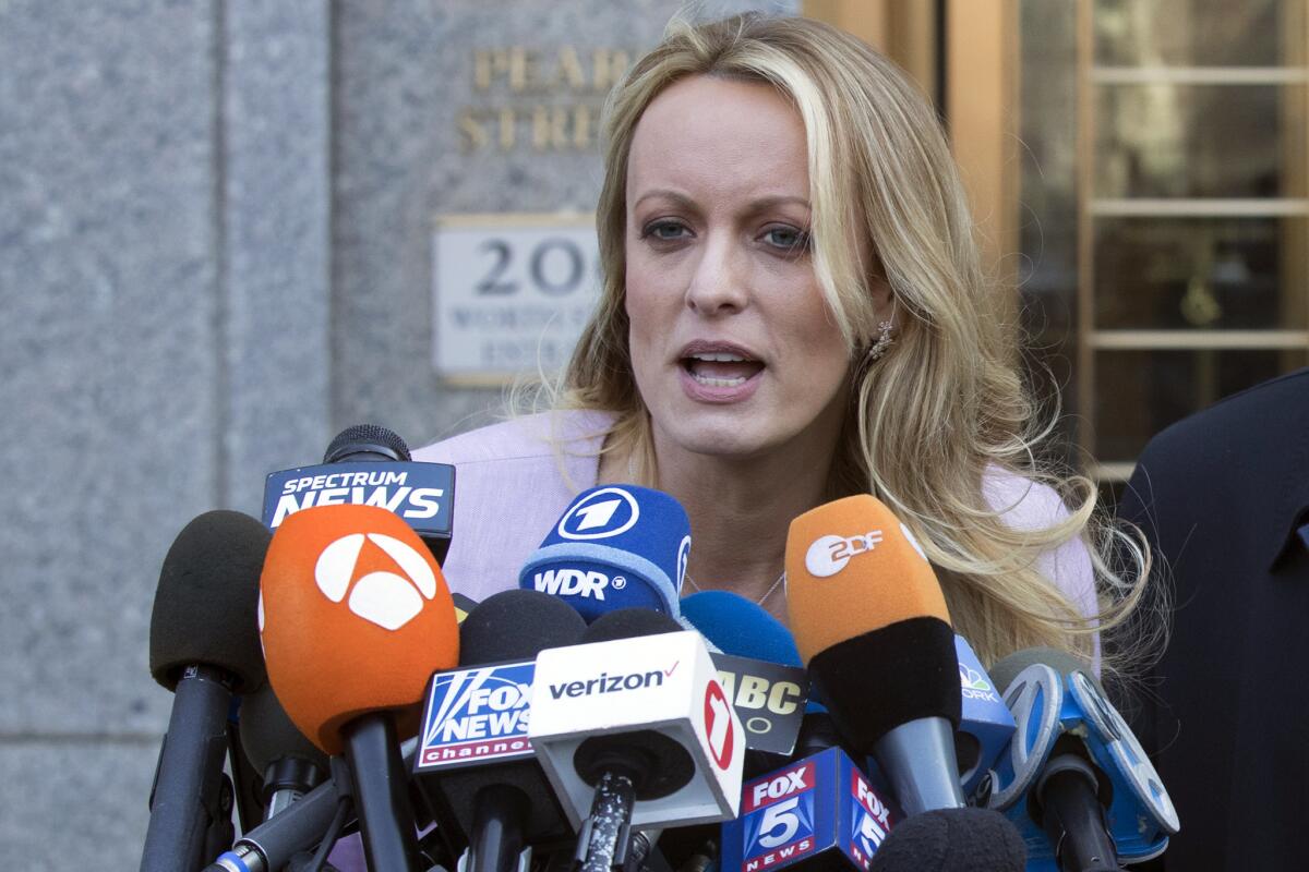 Adult film actress Stormy Daniels speaks outside federal court in New York in 2018.