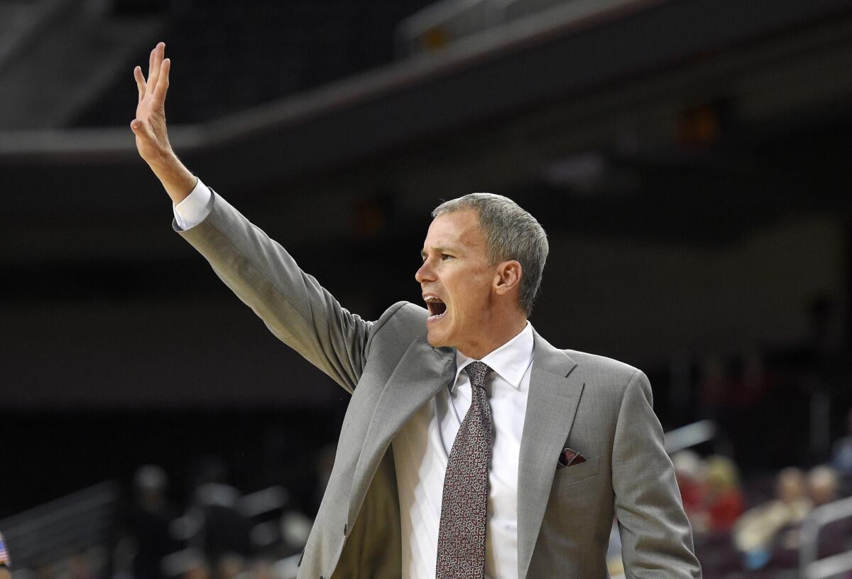 USC Coach Andy Enfield gestures to his team during the first half of a game against Monmouth on Nov. 16.