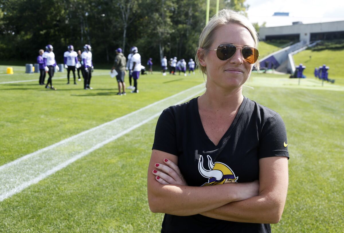 FILE - Kelly Kleine, the Minnesota Vikings coordinator of college scouting, poses during NFL football practice in Eden Prairie, Minn., in this Sept. 5, 2017, file photo. The Denver Broncos have hired Kelly Kleine as executive director of football operations and special advisor to the general manager, Monday, May 17, 2021. (AP Photo/Jim Mone, File)