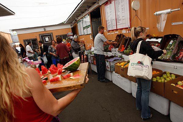 Rawesome Foods members pick up groceries. The private club in Venice is an outlet for raw and unprocessed foods, including unpasteurized dairy products. See full story