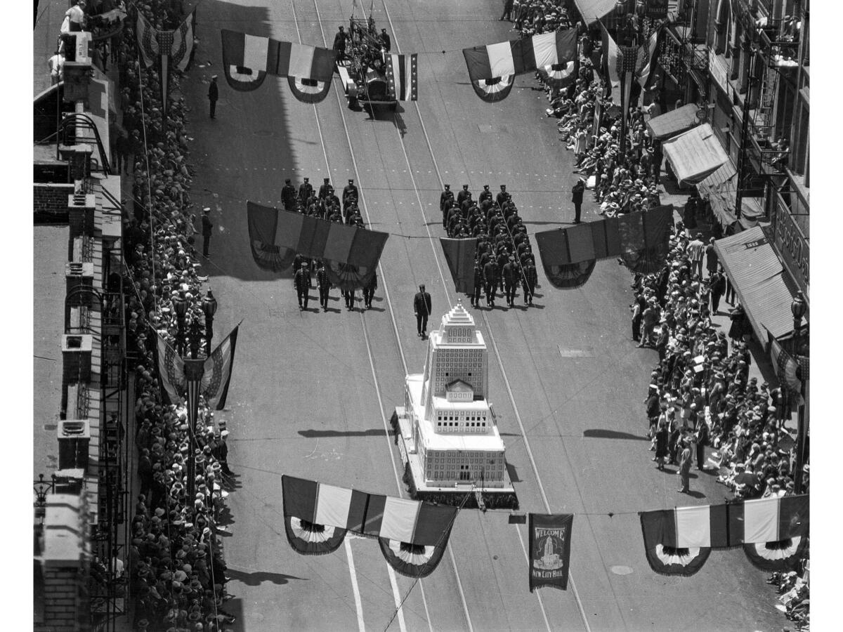 April 26, 1928: Los Angeles Fire Department float featuring a replica of City Hall during dedication parade.