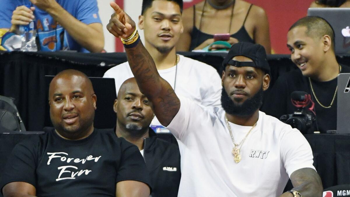 LeBron arrives at NBA Summer League, wearing Lakers shorts 