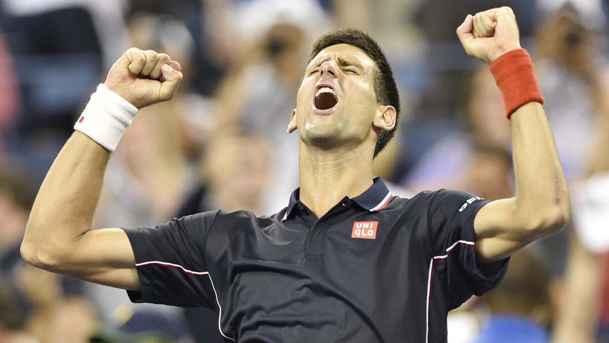 Novak Djokovic celebrates his quarterfinal victory over Andy Murray at the U.S. Open on Wednesday.