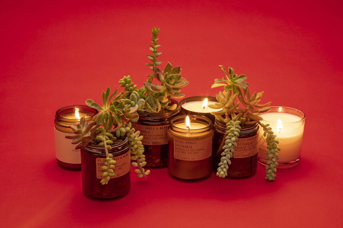 Empty candle jars can be up-cycled as holiday gifts. 