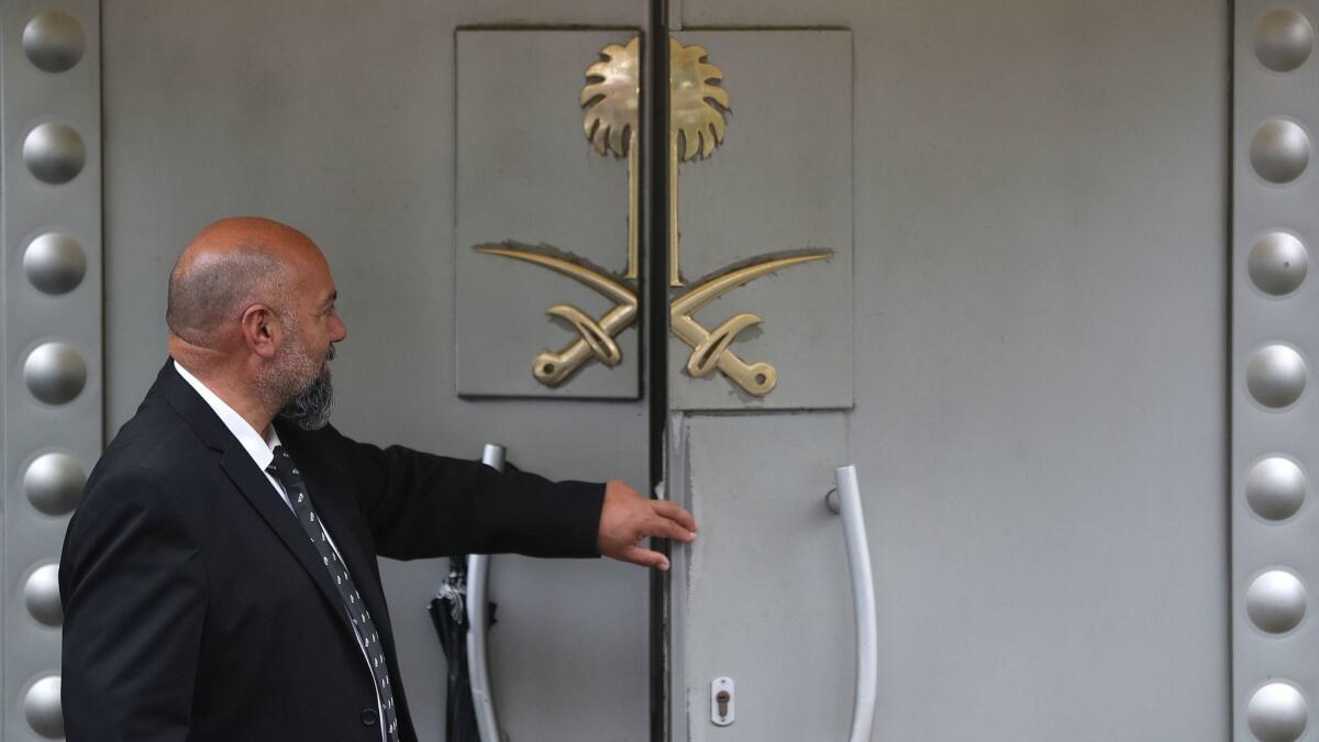 An official stands in front of the Saudi Consulate in Istanbul, Turkey, on Oct. 15.
