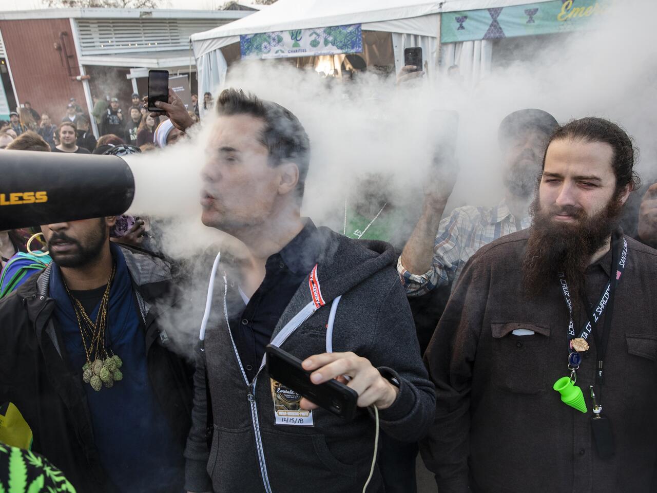 A leaf blower is used to blow pot smoke into a crowd of attendees at the first post-legalization Emerald Cup, an annual celebration of cannabis at the Sonoma County Fairgrounds. Legalization is causing a shakeup in California's pot industry of old, with small farms trying to compete in a vast new legal marketplace.