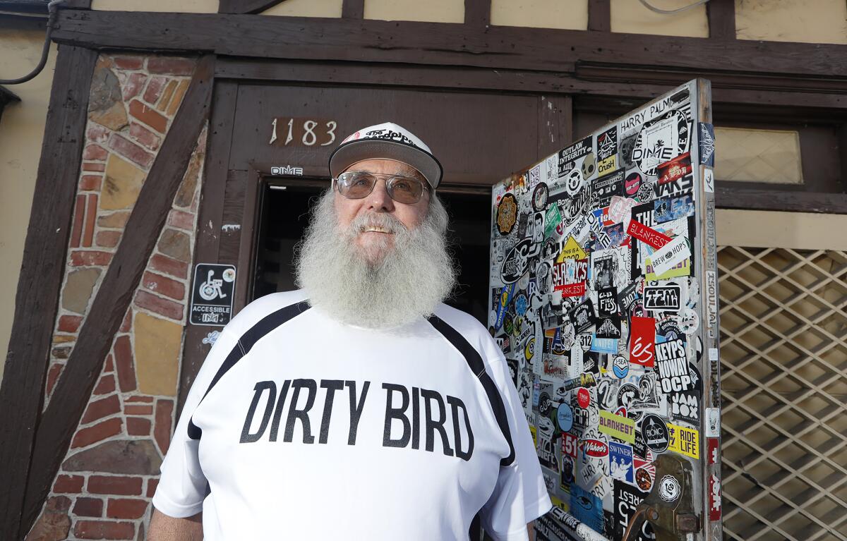 Longtime owner Chuck Harrell stands outside the Sandpiper Lounge, also known to locals as the "Dirty Bird" in Laguna Beach.