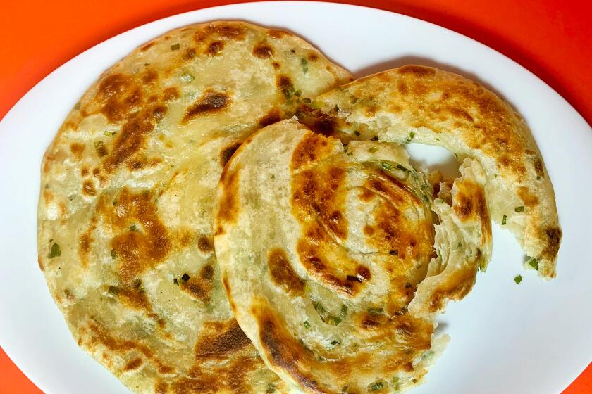 LOS ANGELES, CA.,(May 1, 2020) How to boil water -scallion pancakes (Geneveive Ko/ Los Angeles Times)