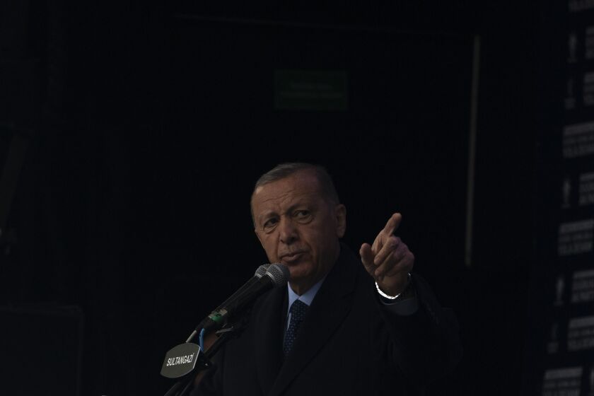 FILE - People's Alliance's presidential candidate Recep Tayyip Erdogan speaks to his supporters during an elections campaign rally in Istanbul, Turkey, Friday, May 12, 2023. Recep Tayyip Erdogan, 69, takes the oath of office Saturday and starts his third presidential term after scoring another electoral victory last month. Already the longest-serving leader in the republic's history, Erdogan will now be stretching his rule into a third decade - until 2028 – and possibly even longer with the help of a friendly parliament. (AP Photo/Khalil Hamra, file)
