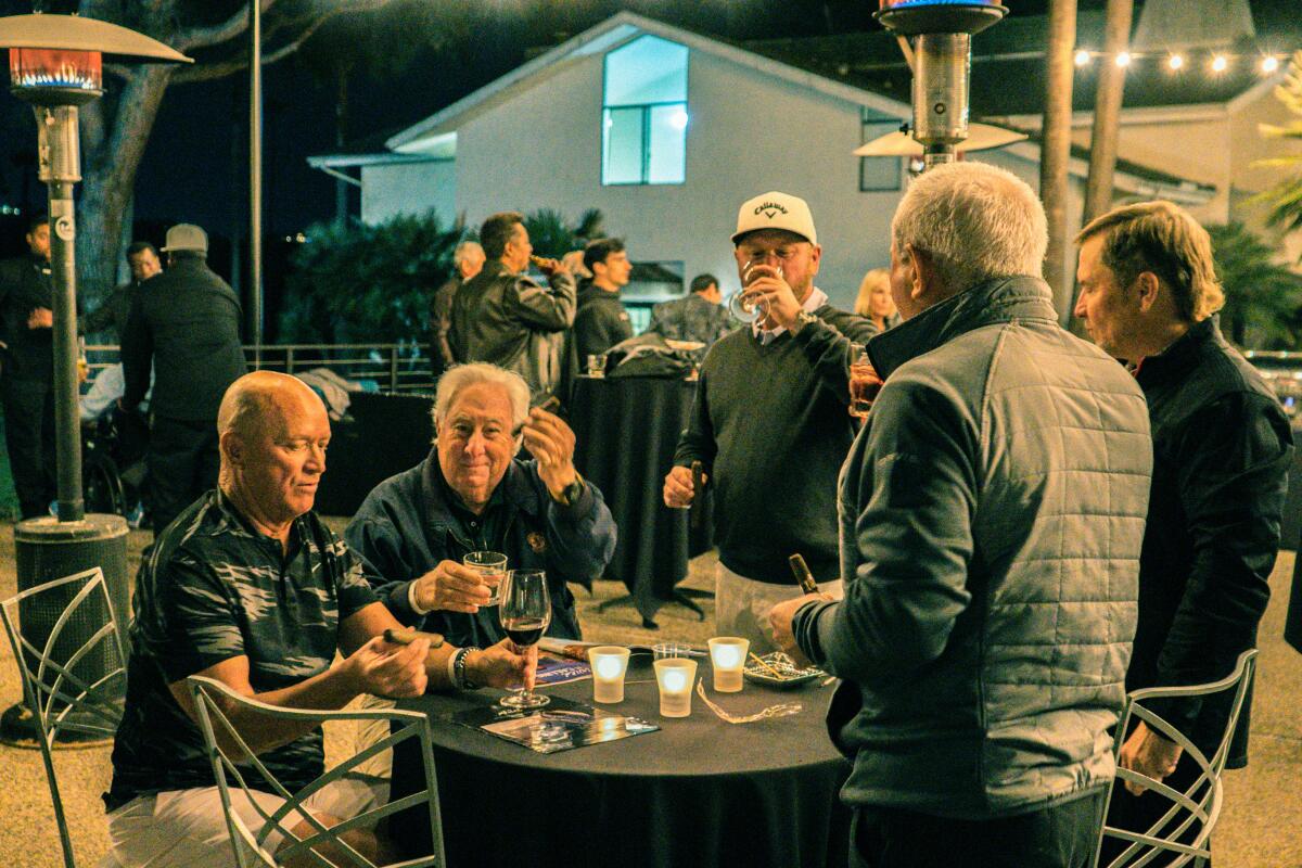 Carmel Valley Cigar Club members enjoy the party.