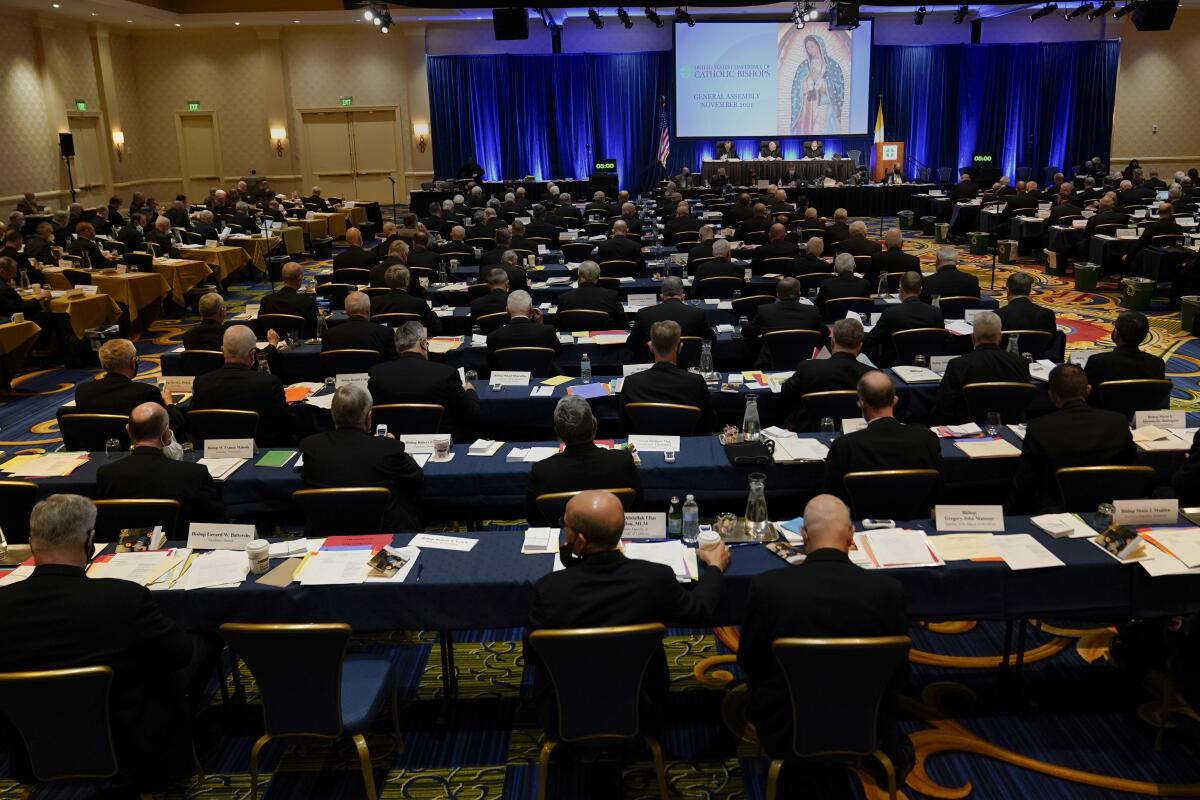 Clergy attend the Fall General Assembly meeting of the United States Conference of Catholic Bishops