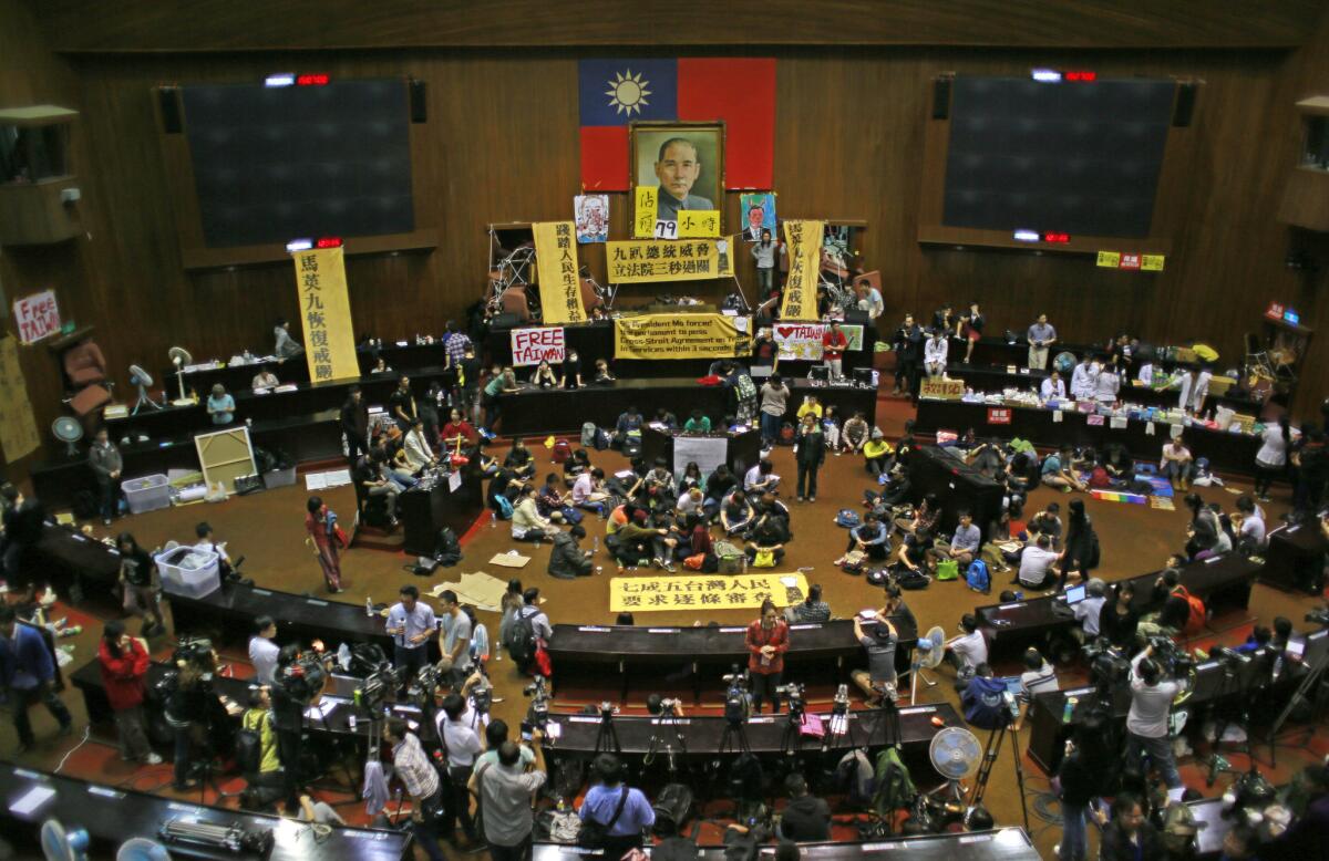 Students occupy the Taiwanese legislative building to protest a trade pact with China.