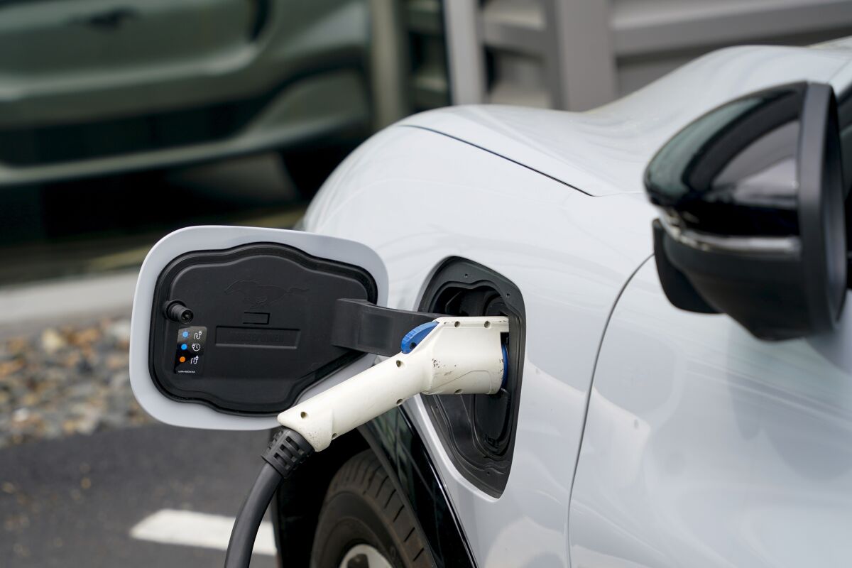 A vehicle at an electric plug-in. 