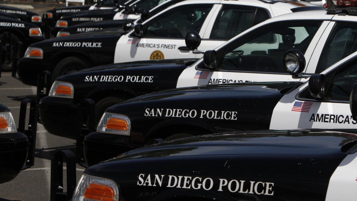 A San Diego police officer and a suspect he was trying to arrest were seriously injured early Thursday after being struck by a car.