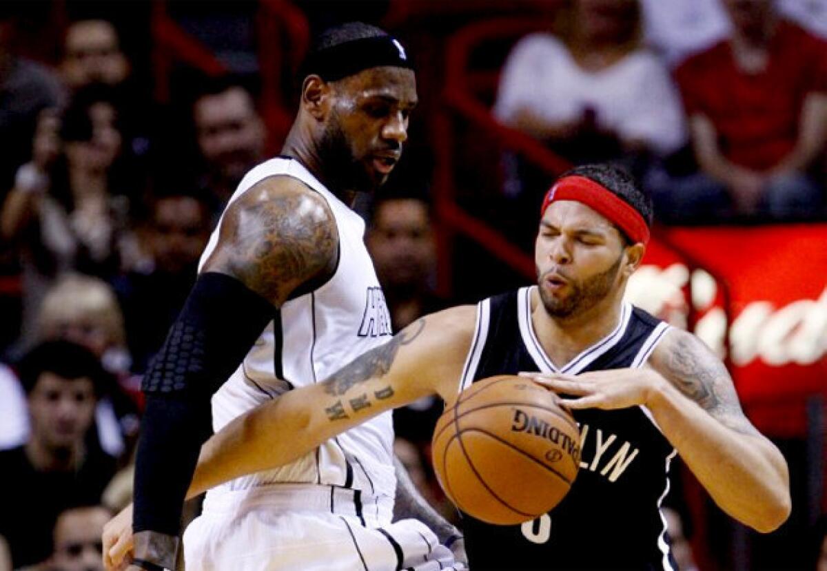 LeBron James and the Miami Heat are 2-0 against Deron Williams and the Brooklyn Nets this season.