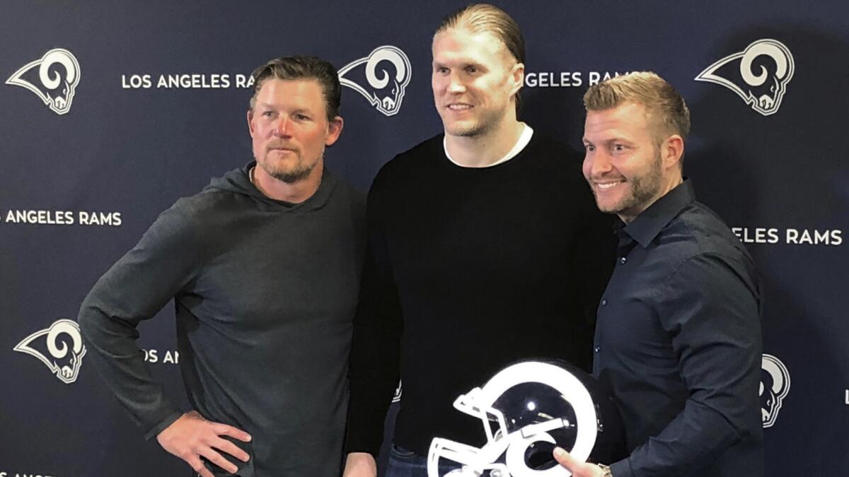 Rams general manager Les Snead, left, linebacker Clay Matthews and coach Sean McVay