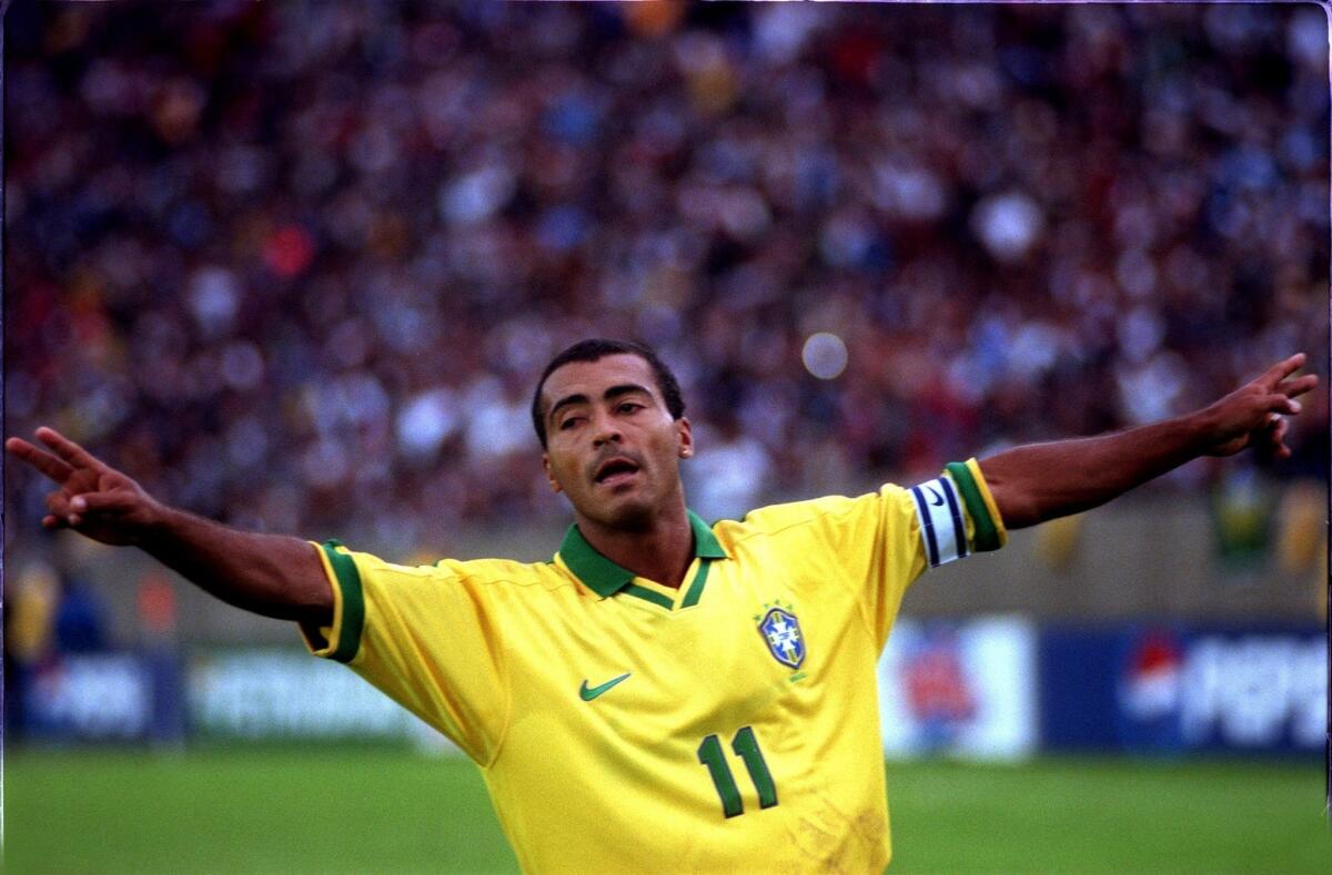 Romario, shown playing for Brazil in the 1998 World Cup, is using his current position as a congressman to criticize FIFA, Sepp Blatter and the planners of the 2014 World Cup headed for his country.