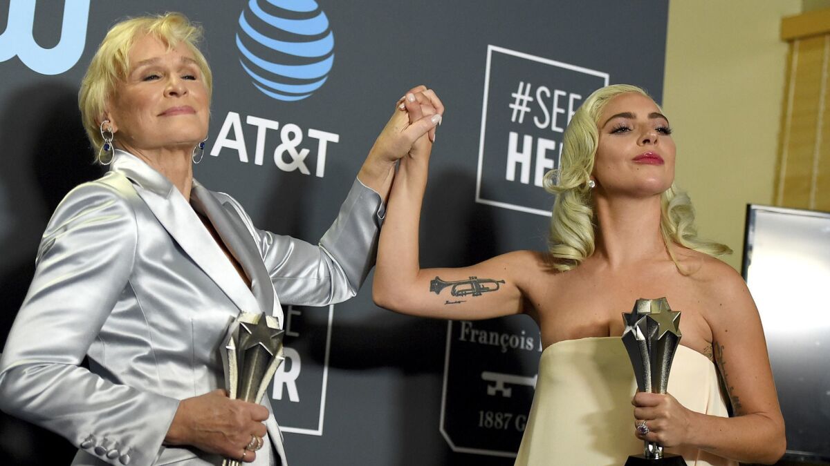 Glenn Close, left, and Lady Gaga tie as winner for the best actress award at the 24th Critics' Choice Awards at the Barker Hangar in Santa Monica.