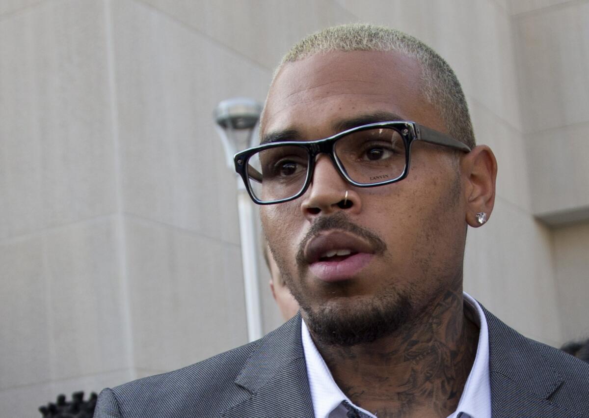 Chris Brown, shown leaving court Sept. 2 in Washington, D.C., said Thursday about the Ray Rice case: "It's all about how you push forward and how you control yourself."