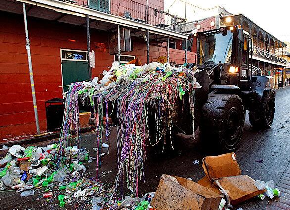 There's never a shortage of beads at Mardi Gras. Here's proof: Trash is scooped up on Fat Tuesday in the French Quarter, clearing the decks for the final day of revelry in the yearly celebration.