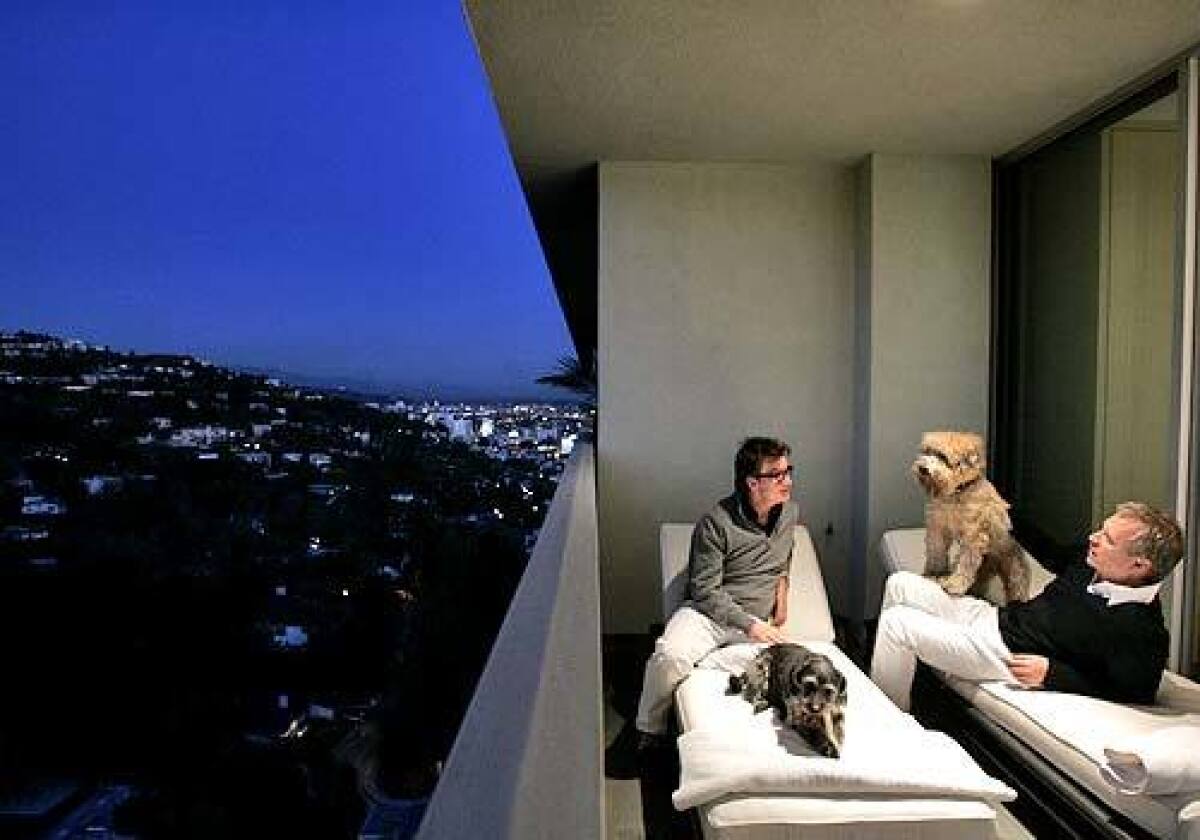 Martin Fassnidge, left, and Franck Verhagen enjoy the L.A. view.