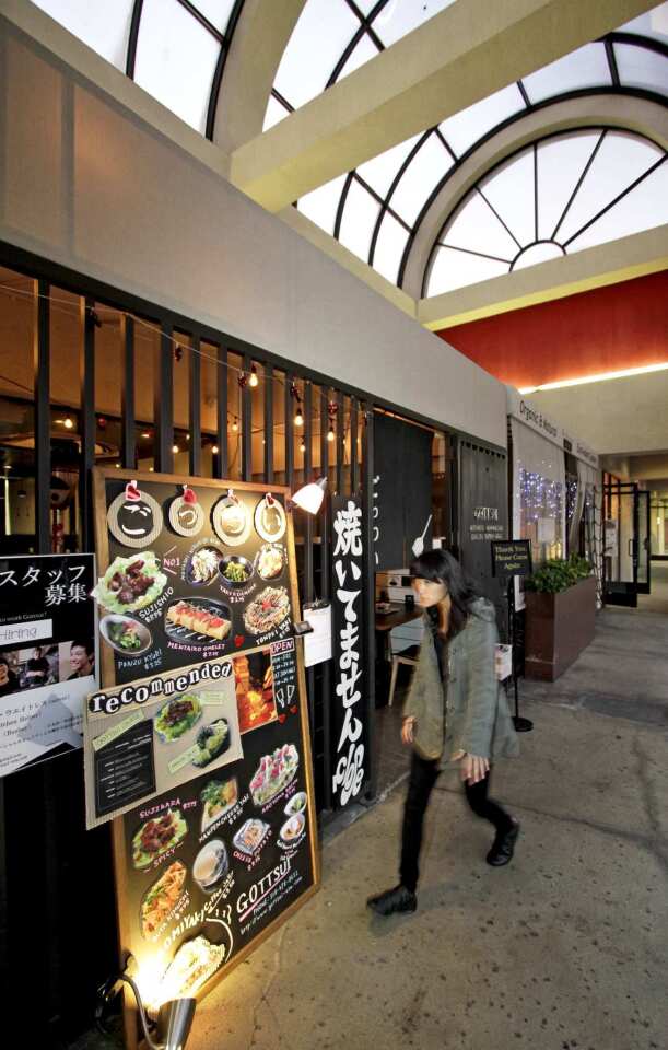 The exterior of Gottsui Japanese Okonomiyaki restaurant in a shopping center on Sawtelle Boulevard.